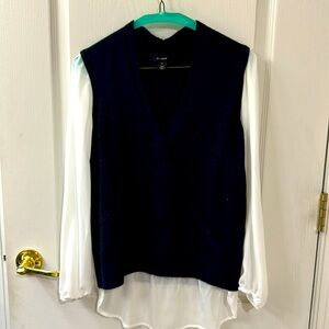 Halogen size XS dark blue with white sleeve, one time used.